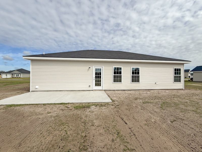 Exterior details and patio area of a home in The Village at Sassafras, Allenhurst (Image 2). Exterior details and patio area of a home in The Village at Sassafras, Allenhurst (Image 2).