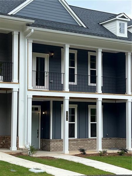 Front exterior of a new home in The Park at Gainesville Township, Gainesville, GA, highlighting curb appeal (Image 21). Front exterior of a new home in The Park at Gainesville Township, Gainesville, GA, highlighting curb appeal (Image 21).