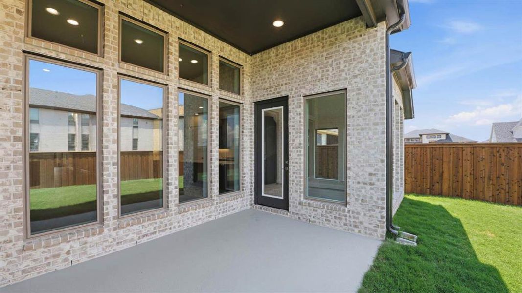 Exterior details and patio area of a home in Lakewood Village, Lakewood Village (Image 3). Exterior details and patio area of a home in Lakewood Village, Lakewood Village (Image 3).