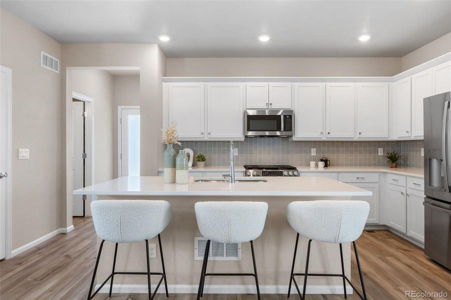 Furnished interior view inside a new home in Woodrose at Painted Prairie, Aurora (Image 28). Furnished interior view inside a new home in Woodrose at Painted Prairie, Aurora (Image 28).