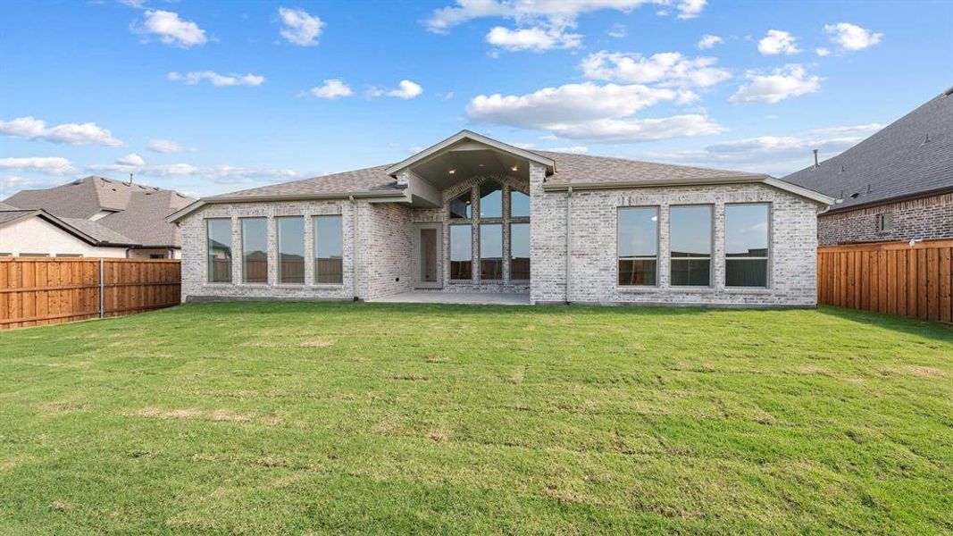 Exterior details and patio area of a home in Terraces 62', Rockwall (Image 4). Exterior details and patio area of a home in Terraces 62', Rockwall (Image 4).