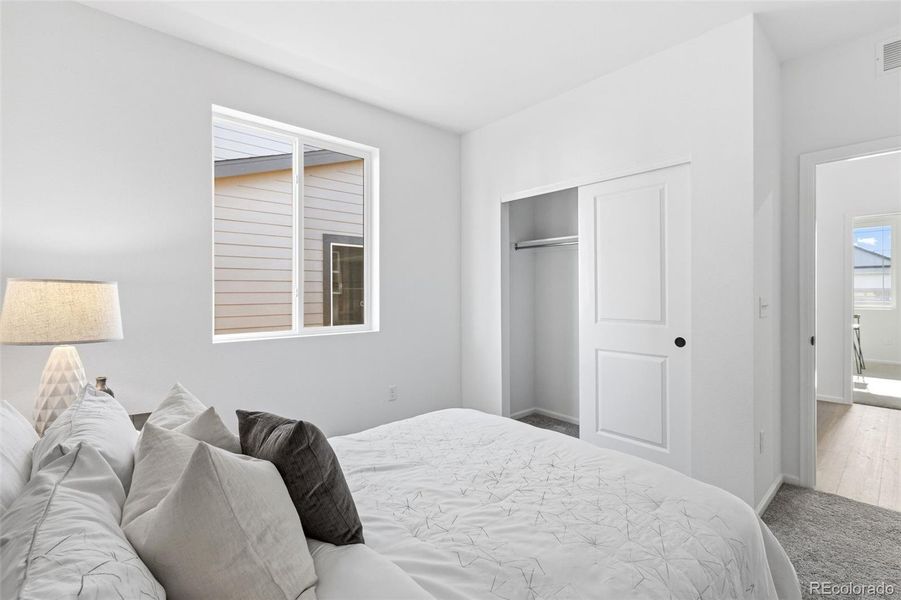 Furnished interior view inside a new home in The Cottages Collection at Ridgeline Vista, Brighton (Image 34).