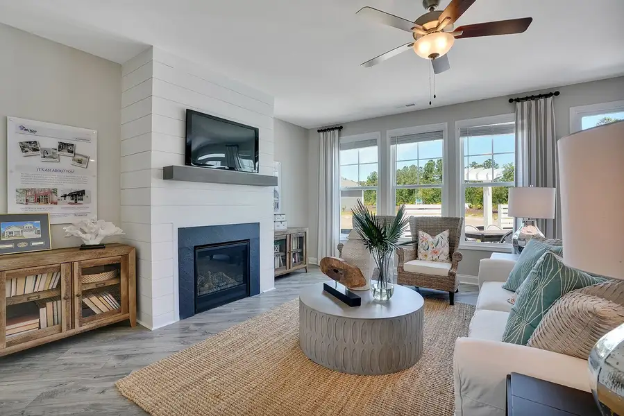 Representative furnished interior of a home built from the Promenade by McKee Homes in The Cottages at 78 North, Sanford (Image 23).