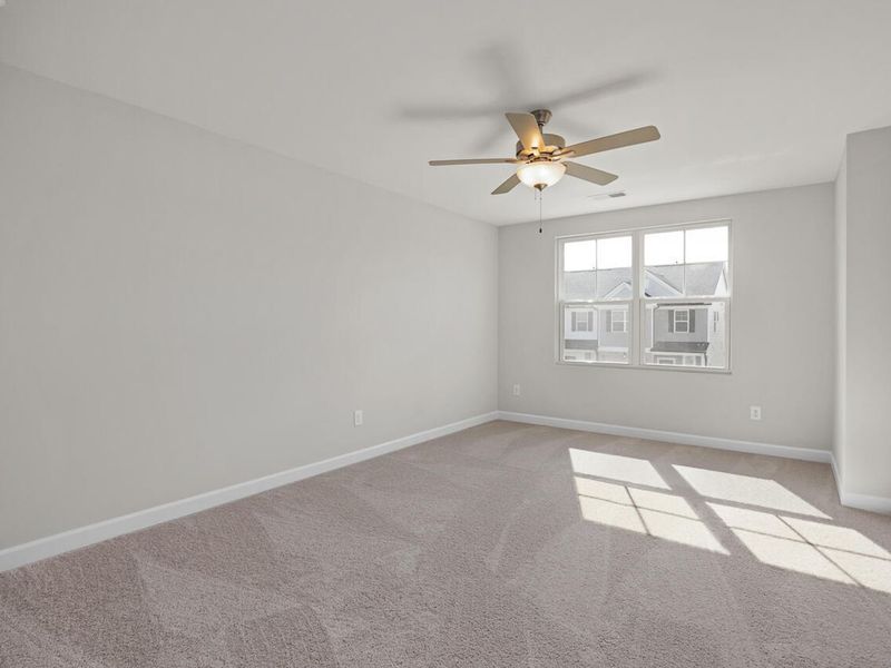 Spacious, unfurnished interior of a new home in Springvale, Fuquay Varina (Image 25).