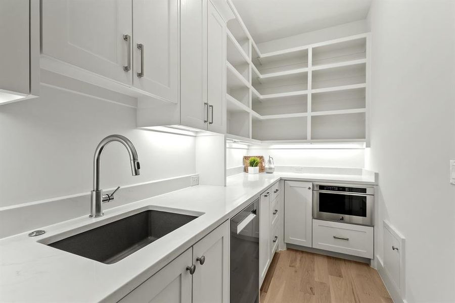 Butlers pantry sink, Bosch dishwasher and Jennair microwave Butlers pantry sink, Bosch dishwasher and Jennair microwave