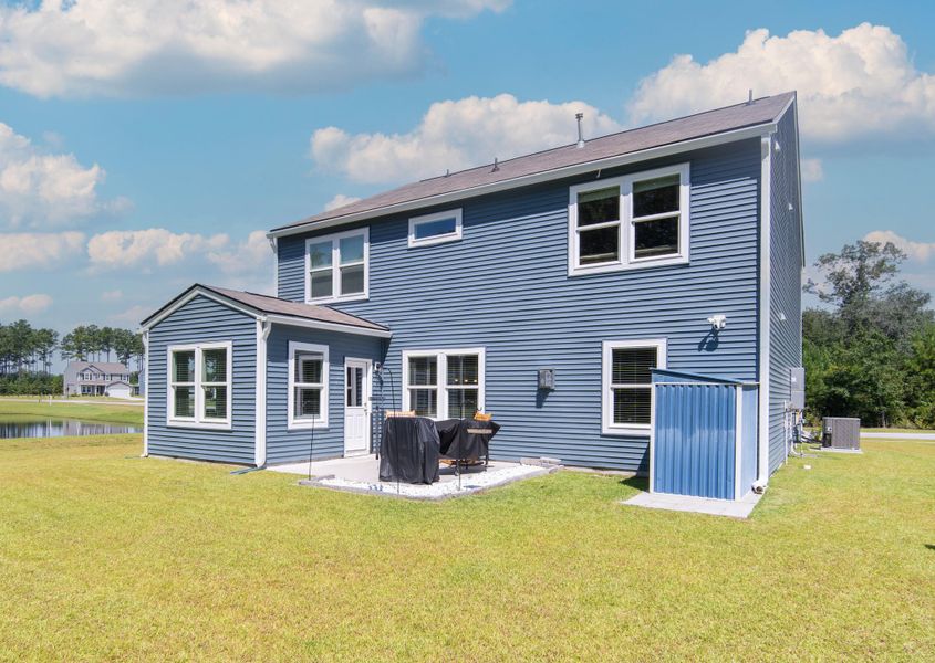 Front exterior of a new home in , Johns Island, SC, highlighting curb appeal (Image 22).