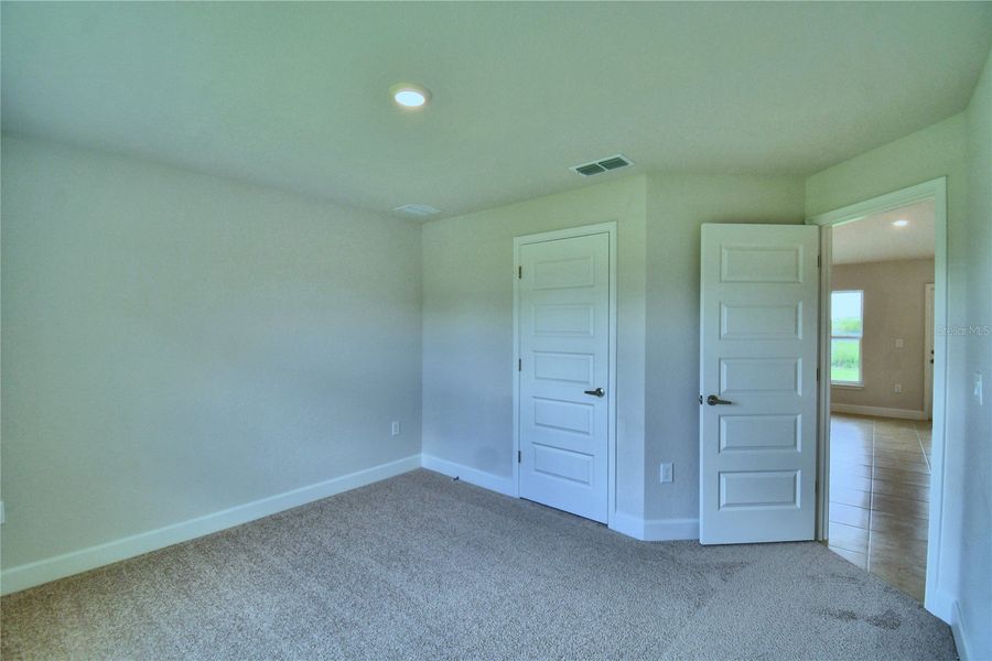 Spacious, unfurnished interior of a new home in Cadence Crossing, Auburndale (Image 23).