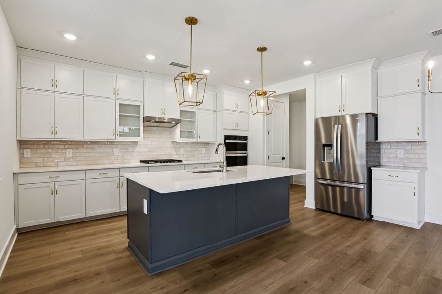 Furnished interior view inside a new home in Station Hill - Reserve Series, Franklin (Image 4).