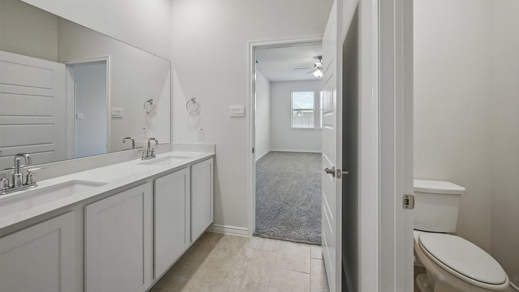 Representative furnished interior of a home built from the Medbourne by D.R. Horton in Fireside by the Lake, Garland (Image 3).