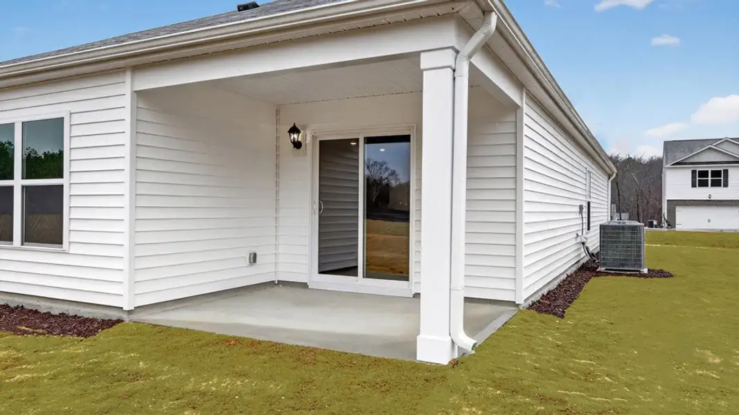 Exterior details and patio area of a home in Wilson's Ridge, Wilson's Mills (Image 3).