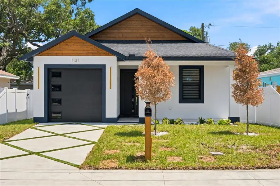 Front exterior of a new home in , Clearwater, FL, highlighting curb appeal (Image 1). Front exterior of a new home in , Clearwater, FL, highlighting curb appeal (Image 1).