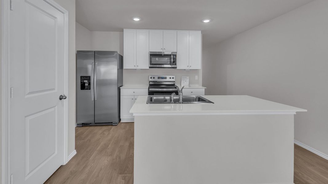 Furnished interior view inside a new home in Swenson Heights, Seguin (Image 5).