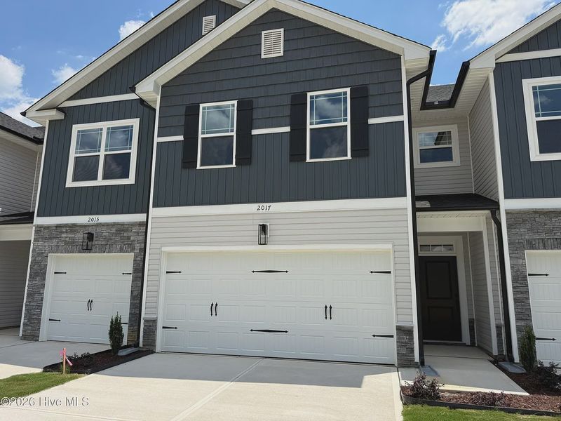 Front exterior of a new home in Joyner Park, Rocky Mount, NC, highlighting curb appeal (Image 1). Front exterior of a new home in Joyner Park, Rocky Mount, NC, highlighting curb appeal (Image 1).