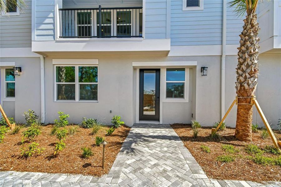 Exterior details and patio area of a home in EvenTide, New Smyrna Beach (Image 3).
