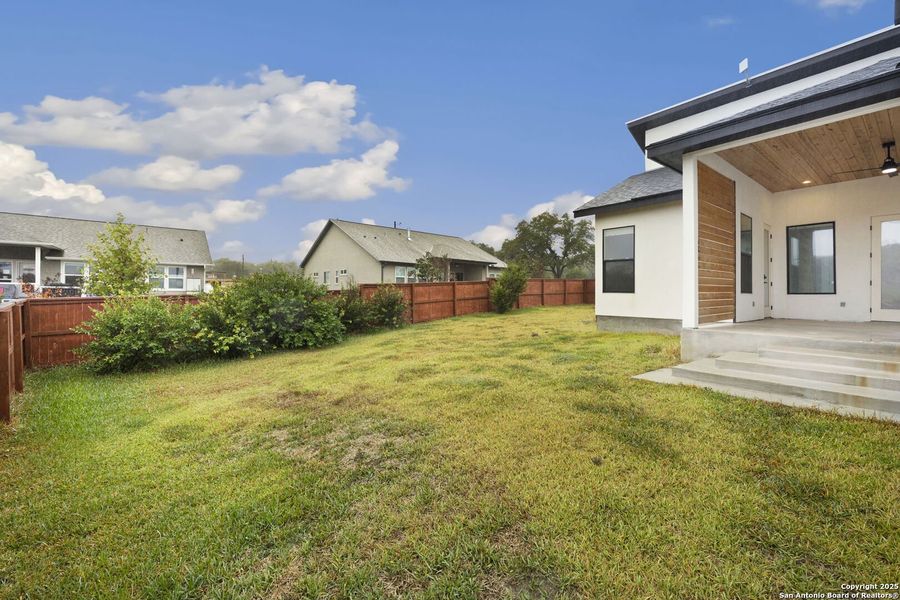 Exterior details and patio area of a home in , Blanco (Image 29).