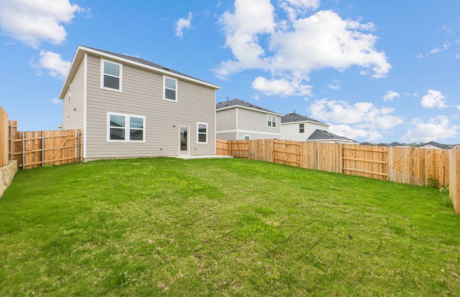 Exterior details and patio area of a home in Sunfield, Buda (Image 23).