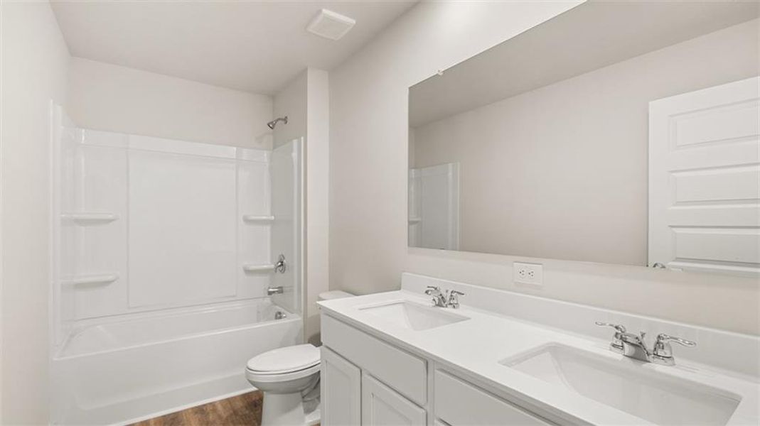 Furnished interior view inside a new home in The Preserve at Agricultural Village, Perry (Image 7).