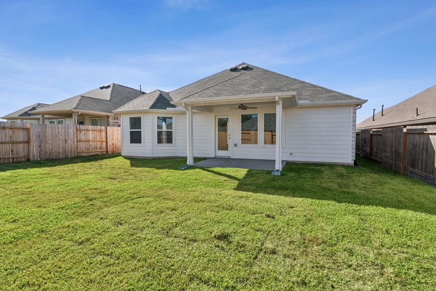 Exterior details and patio area of a home in Magnolia Ridge, Magnolia (Image 4). Exterior details and patio area of a home in Magnolia Ridge, Magnolia (Image 4).