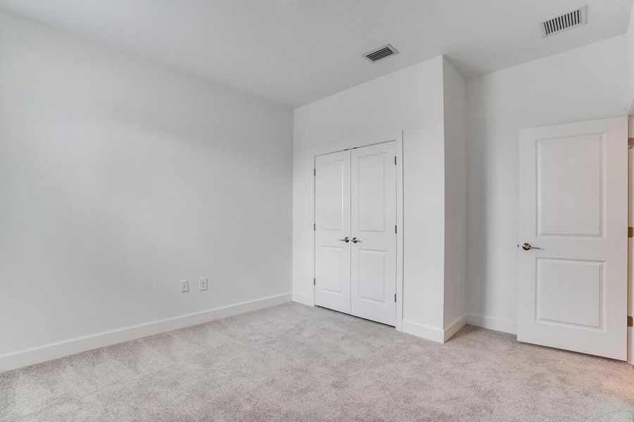 Representative unfurnished interior of a home built from the Tobago by Taylor Morrison in The Cove at West Port, Port Charlotte (Image 13).