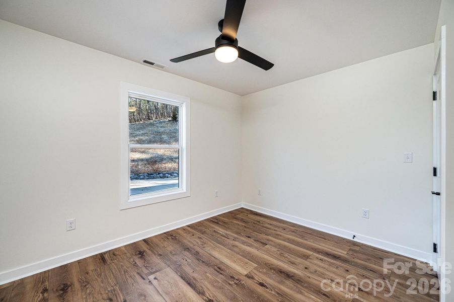 Spacious, unfurnished interior of a new home in , Lenoir (Image 40).