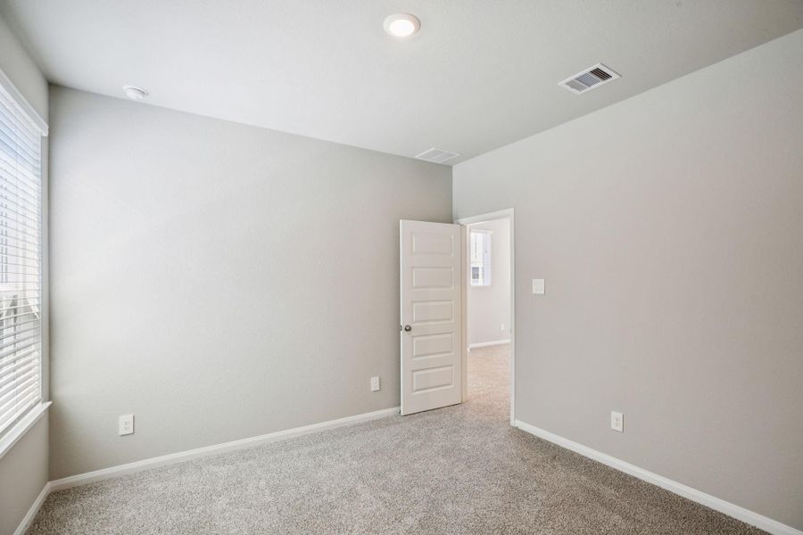 Spacious, unfurnished interior of a new home in Kemah Crossing - Luxe Series, Kemah (Image 33). Spacious, unfurnished interior of a new home in Kemah Crossing - Luxe Series, Kemah (Image 33).