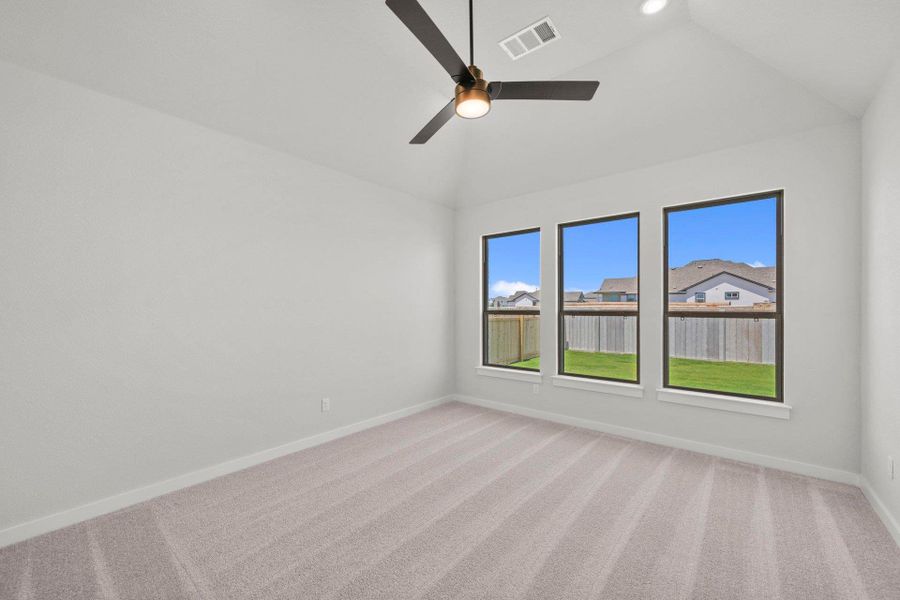 Primary Bedroom with elevated ceiling