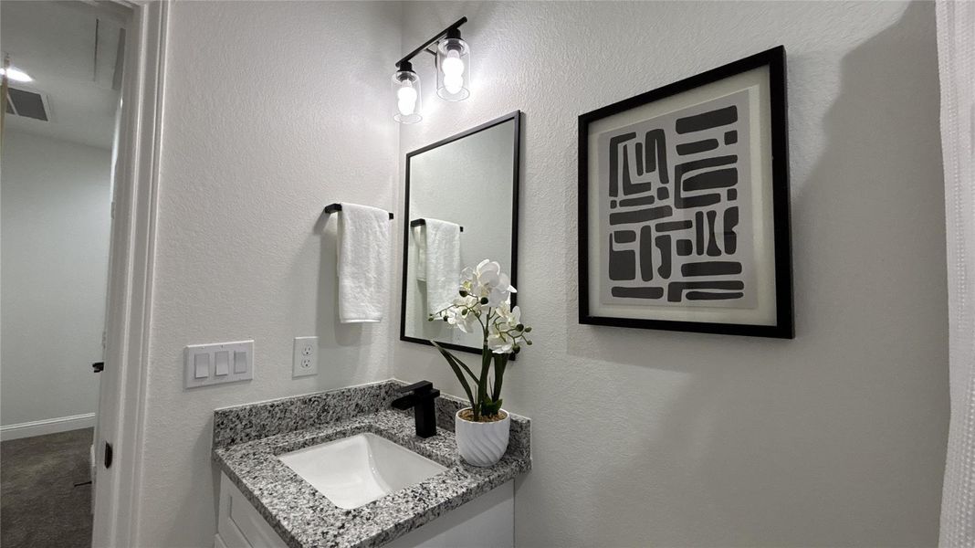 Furnished interior view inside a new home in Hill & Dale Ranch, Splendora (Image 9).