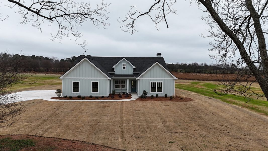 Front exterior of a new home in Rover Roc Farms, Williamson, GA, highlighting curb appeal (Image 6).