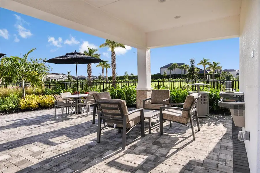 Exterior details and patio area of a home in Cassia at Skye Ranch, Sarasota (Image 2). Exterior details and patio area of a home in Cassia at Skye Ranch, Sarasota (Image 2).