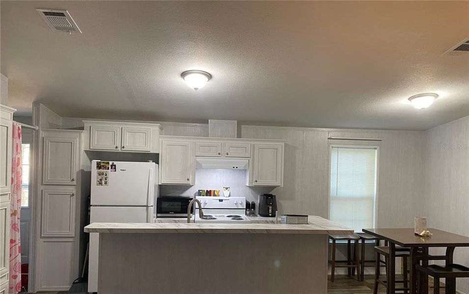 Furnished interior view inside a new home in , Webster (Image 5).
