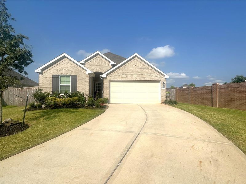 Front exterior of a new home in Lone Star Landing, Montgomery, TX, highlighting curb appeal (Image 19).