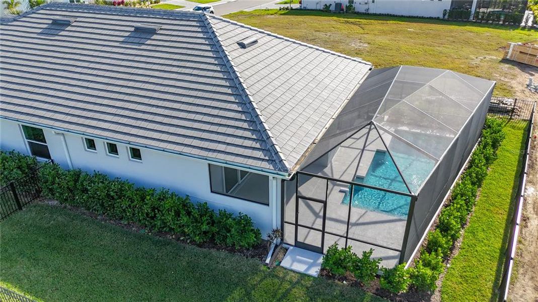 Exterior details and patio area of a home in Watercolor Place, Bradenton (Image 31).