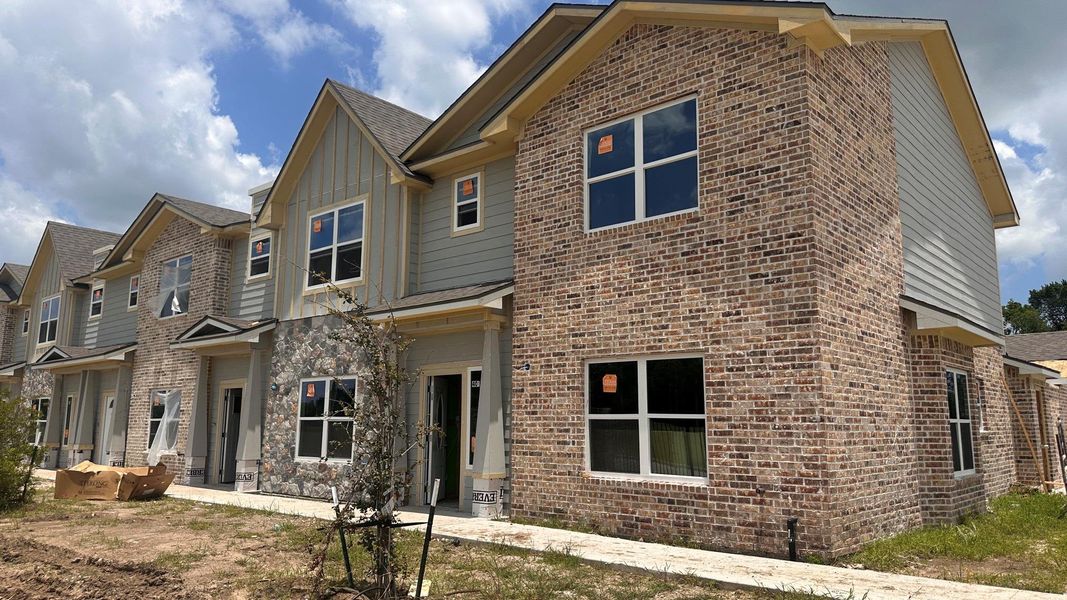 Front exterior of a new home in , Alvin, TX, highlighting curb appeal (Image 2). Front exterior of a new home in , Alvin, TX, highlighting curb appeal (Image 2).