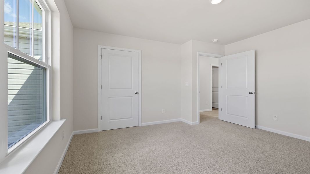 Spacious, unfurnished interior of a new home in Bentley Park, Greenwood (Image 25). Spacious, unfurnished interior of a new home in Bentley Park, Greenwood (Image 25).