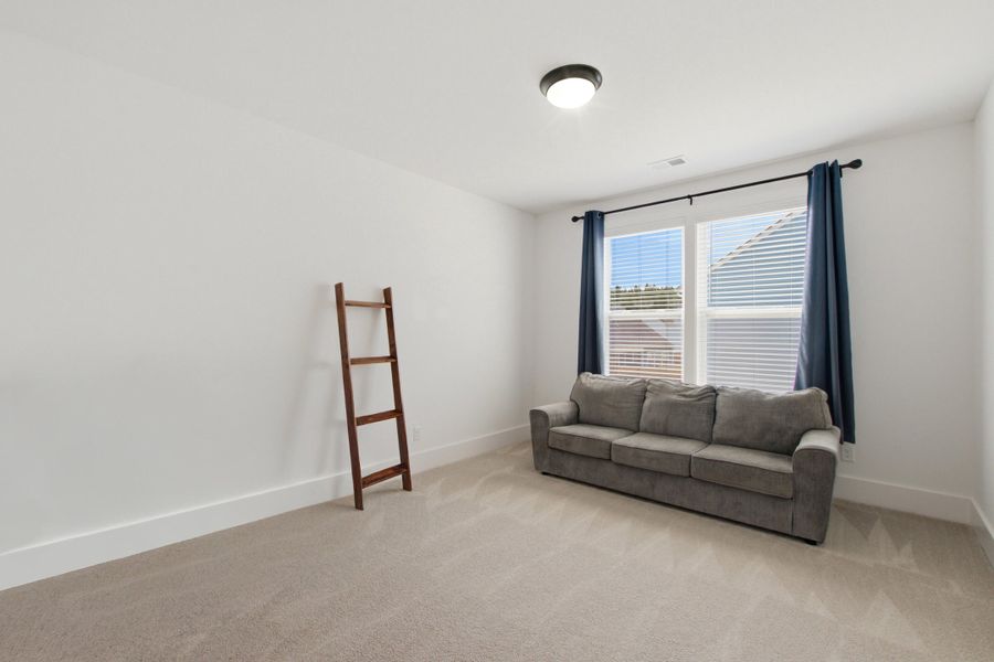 Furnished interior view inside a new home in Homecoming, Ravenel (Image 12).
