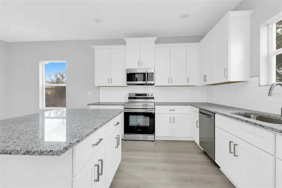 Furnished interior view inside a new home in , Port Charlotte (Image 6).