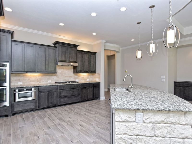 Representative furnished interior of a home built from the San Simeon I by Giddens Homes in Clearwater Ranch, Liberty Hill (Image 280).