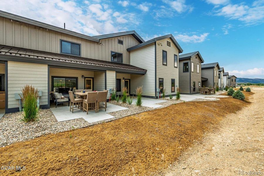 Front exterior of a new home in , Granby, CO, highlighting curb appeal (Image 1). Front exterior of a new home in , Granby, CO, highlighting curb appeal (Image 1).