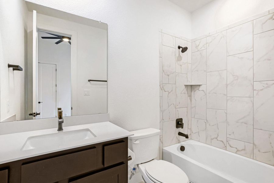 Furnished interior view inside a new home in 6 Creeks at Waterridge, Kyle (Image 13).