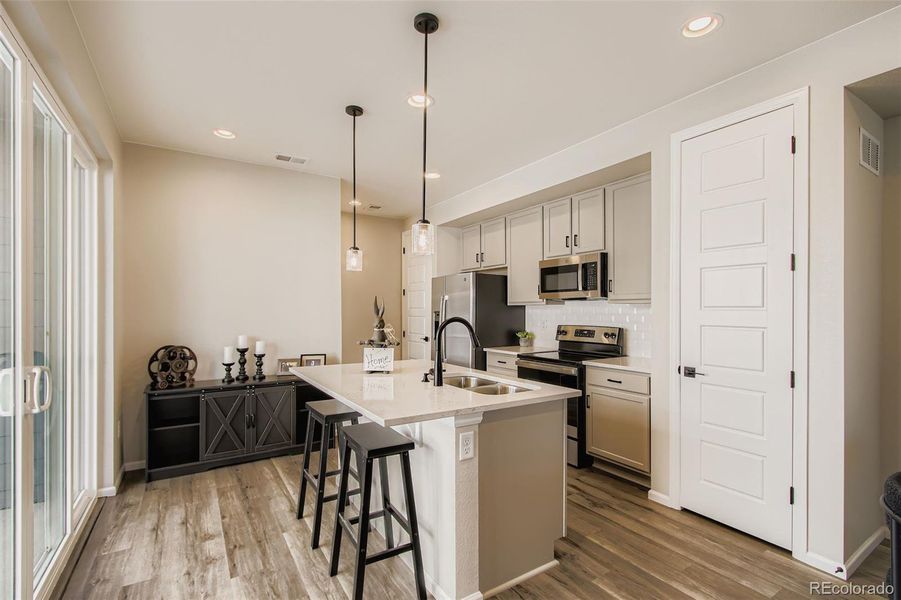 Furnished interior view inside a new home in Haskins Station, Arvada (Image 8).