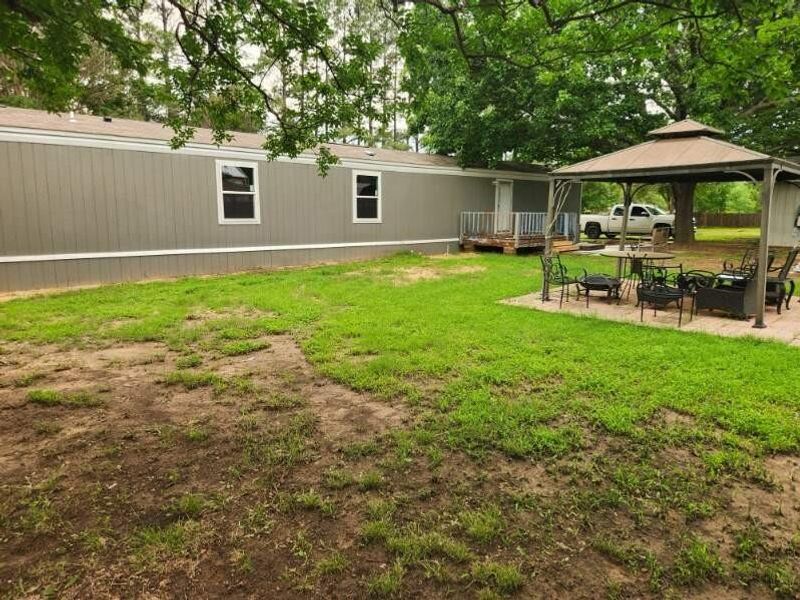 Exterior details and patio area of a home in , Gordonville (Image 12).