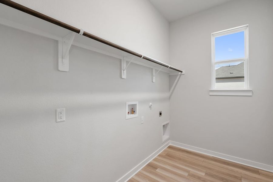 Spacious, unfurnished interior of a new home in Capitol Collection at Lariat, Liberty Hill (Image 41).