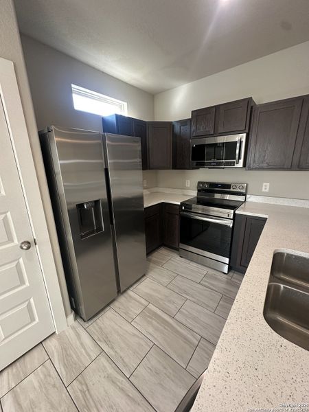 Furnished interior view inside a new home in , San Antonio (Image 6).