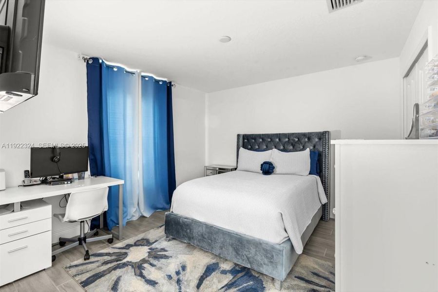 Furnished interior view inside a new home in , Port St. Lucie (Image 9).