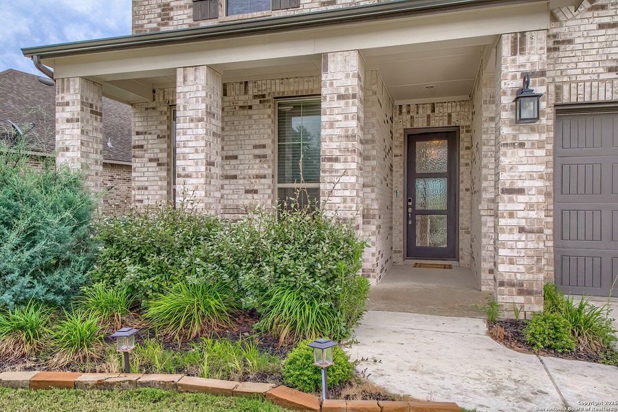 Front exterior of a new home in Regent Park, Boerne, TX, highlighting curb appeal (Image 18).