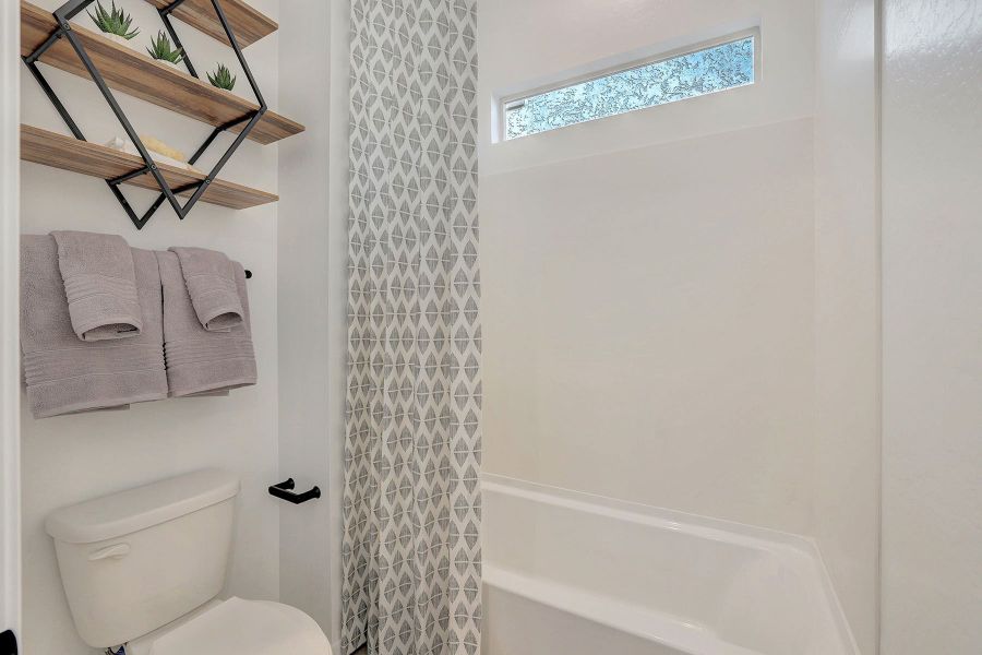 Furnished interior in a model home at Tyler Ranch in Buckeye (Image 19).