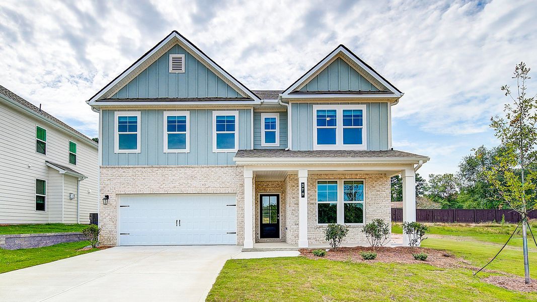 Representative exterior photo of a completed home built from the Wagener by DRB Homes in Abbotts Crossing, Conyers, GA (Image 25).