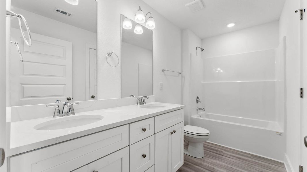 Furnished interior view inside a new home in Chateau Nemours, Port Saint Joe (Image 10).