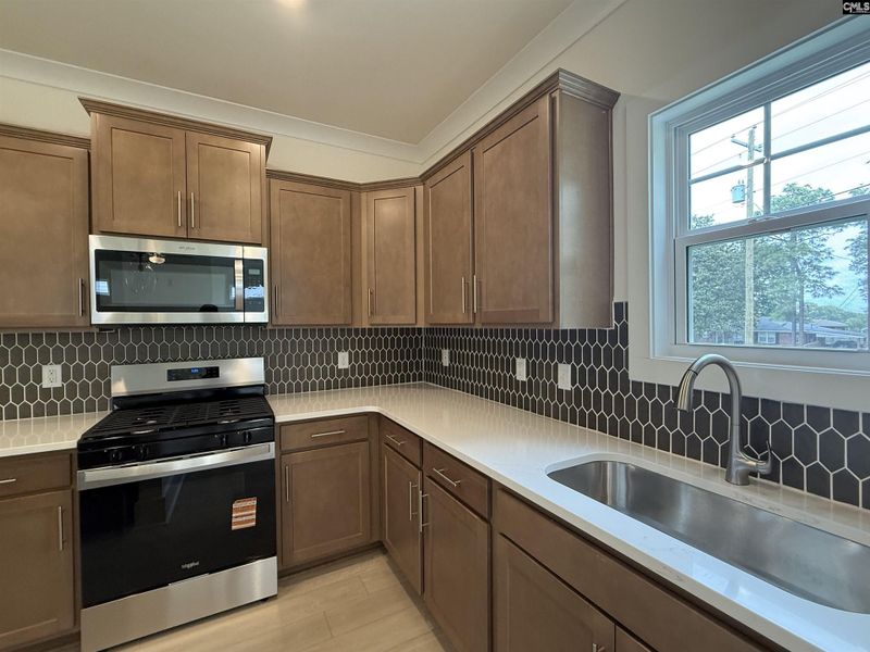 Furnished interior view inside a new home in Cottages at Roofs Pond, West Columbia (Image 9).