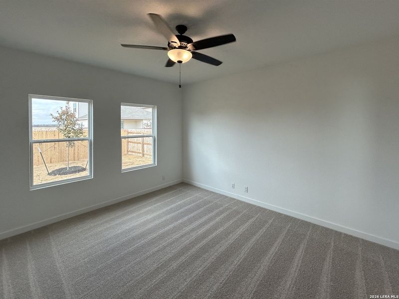 Spacious, unfurnished interior of a new home in Hennersby Hollow, San Antonio (Image 14).